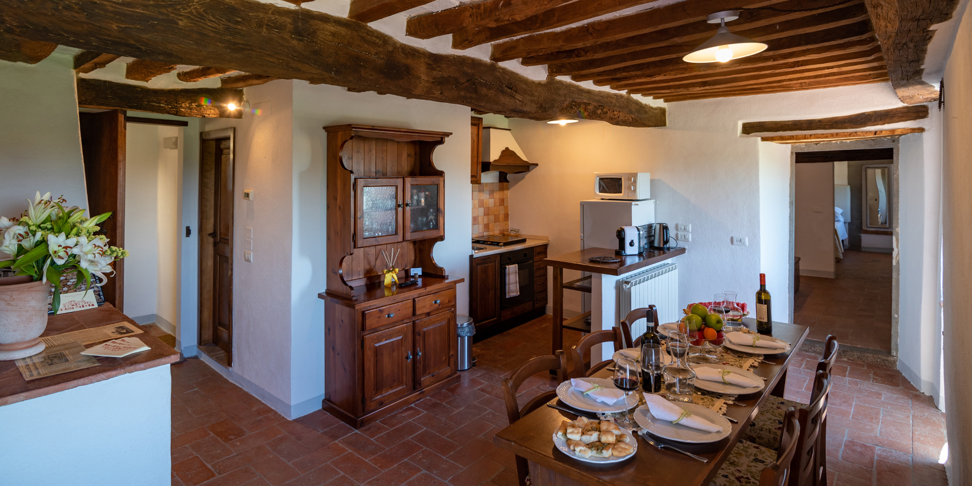 Living room and kitchen in Saena Apartment, Monastero San Silvestro